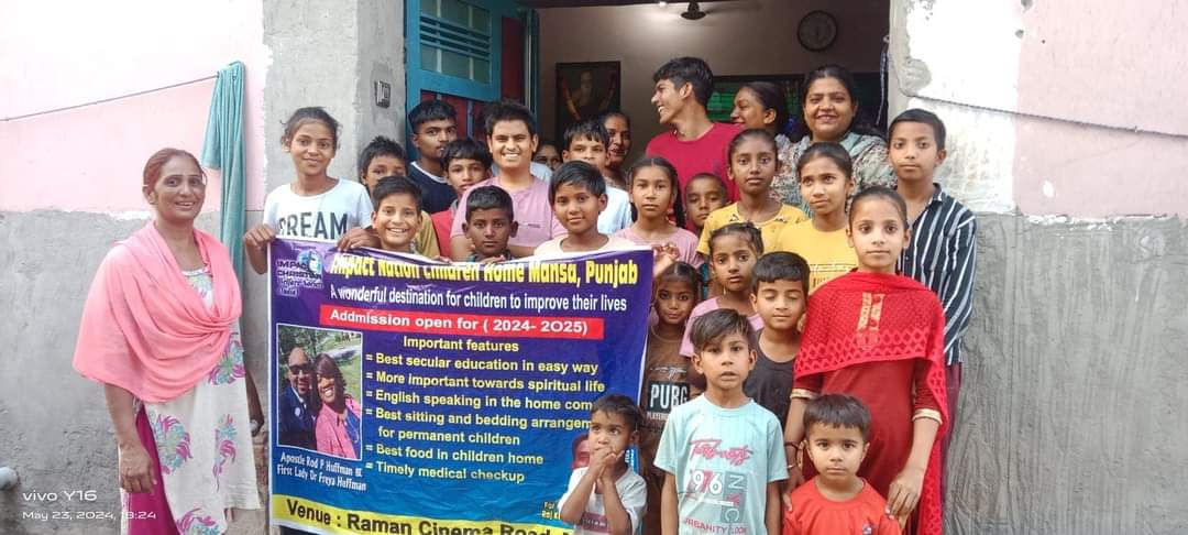 Children and ministry workers gathered at a school in India