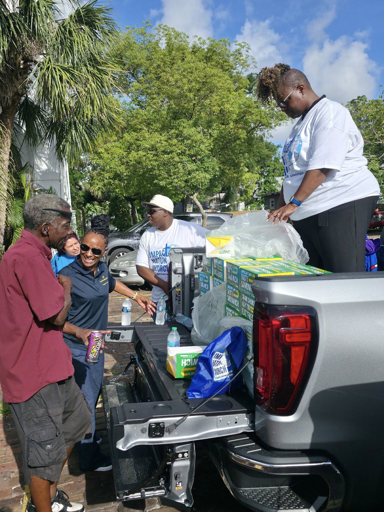 INGF members serving together during community outreach in Tampa